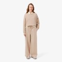 damskie-spodnie-dresowe-lacoste-wide-leg-jersey-beige-na-modelce