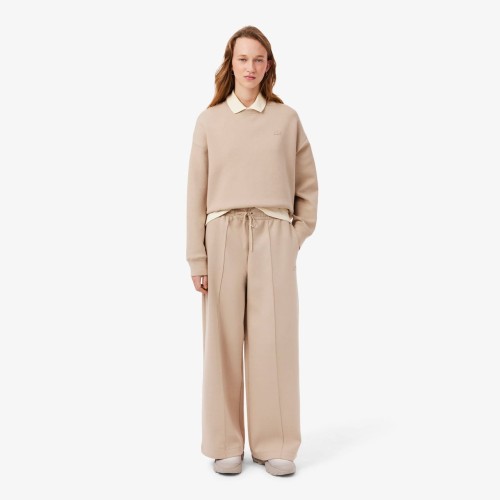 damskie-spodnie-dresowe-lacoste-wide-leg-jersey-beige-na-modelce