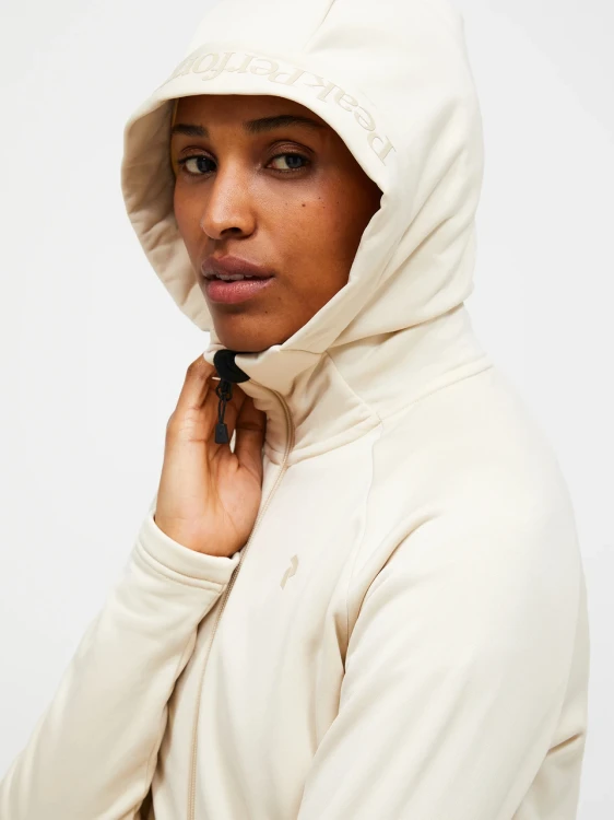 bluza-damska-peak-performance-rider-essentials-zip-hood-sand-fog-kaptur