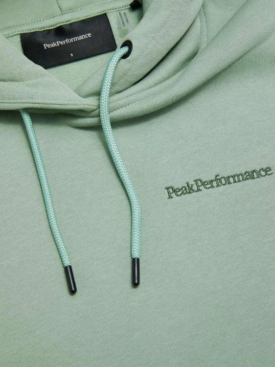 bluza-damska-peak-performance-original-small-logo-green-valley-detal-logo