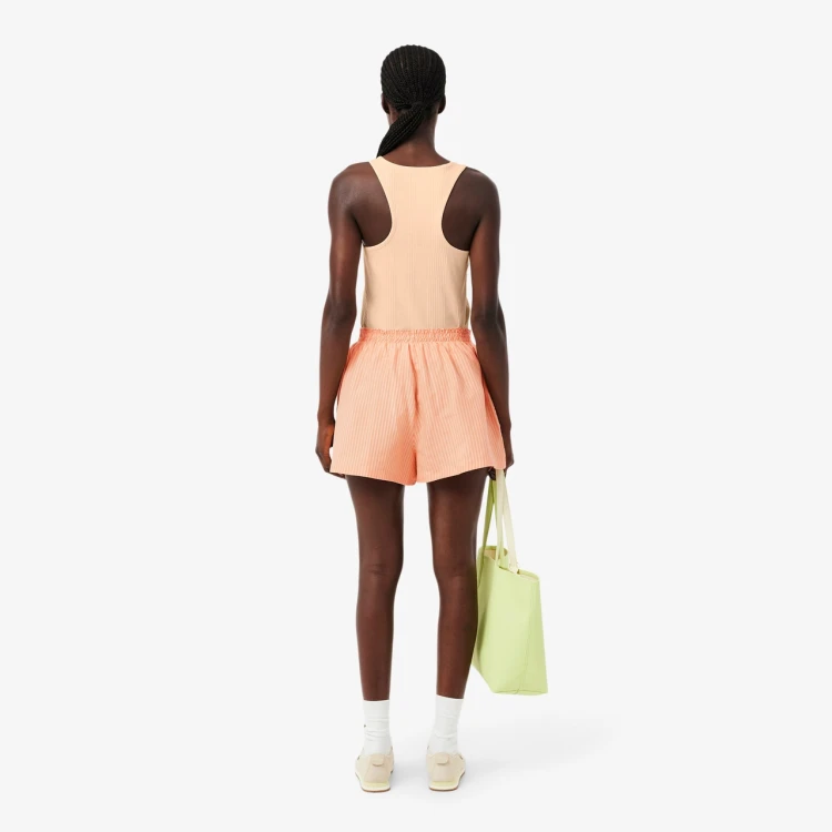 lniane-spodenki-damskie-lacoste-oversized-linen-blend-orange-na-modelce-tyl