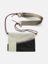 mala-saszetka-na-szyje-peak-performance-accessory-bag-g80391-bezowa-przod